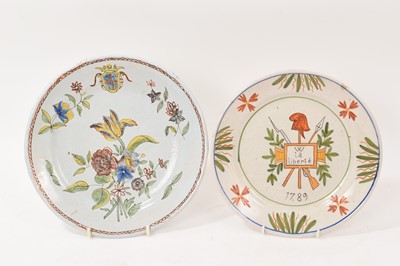 Lot 31 - Two French faience plates, one with Revolutionary decoration and the date 1789