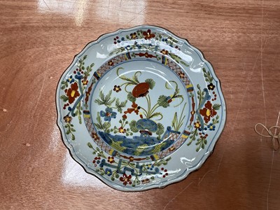 Lot 83 - Faenza faience plate, painted in famille verte palette