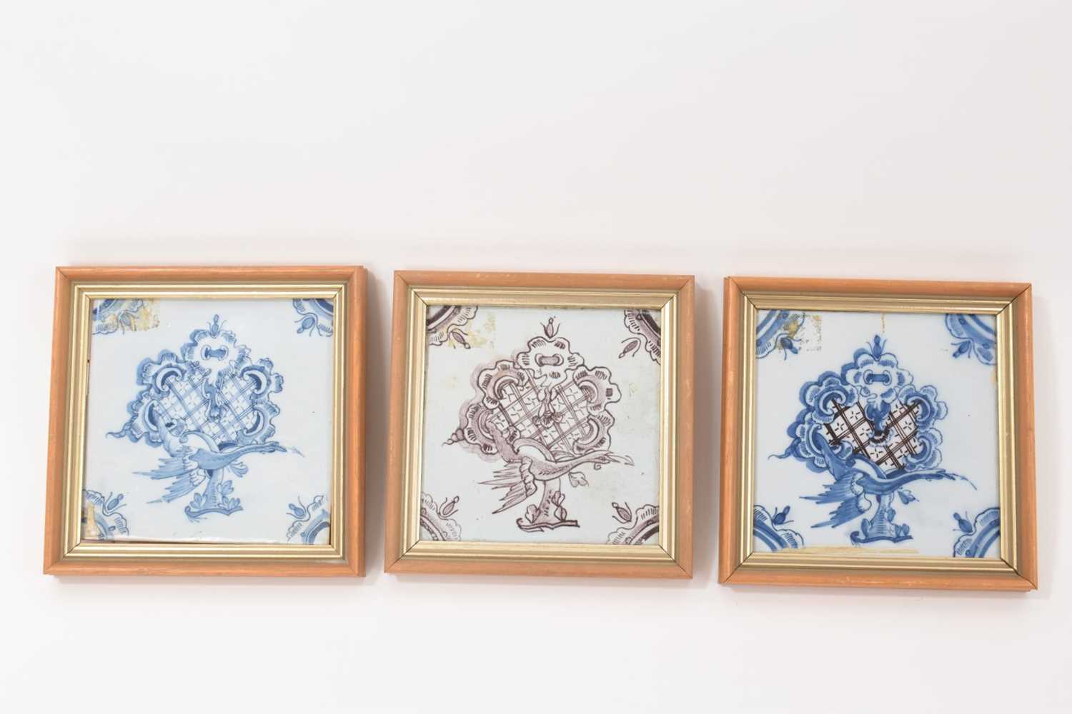 Lot 79 - Three 18th century English Delft tiles, framed