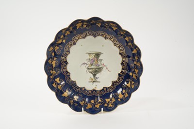 Lot 56 - Worcester junket dish, painted in the London atelier of James Giles with an urn, circa 1770