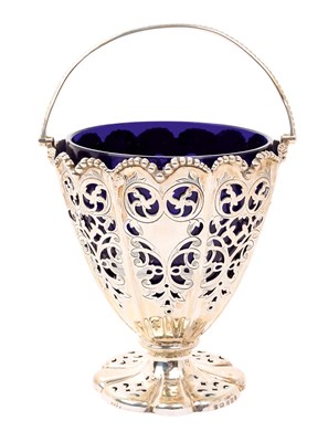 Lot 482 - Victorian silver sugar basket with Bristol blue glass liner