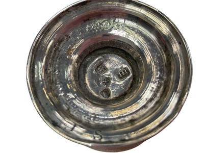 Lot 186 - Pair of George III silver Old English pattern sauce ladles, and a George III silver sugar castor (3)