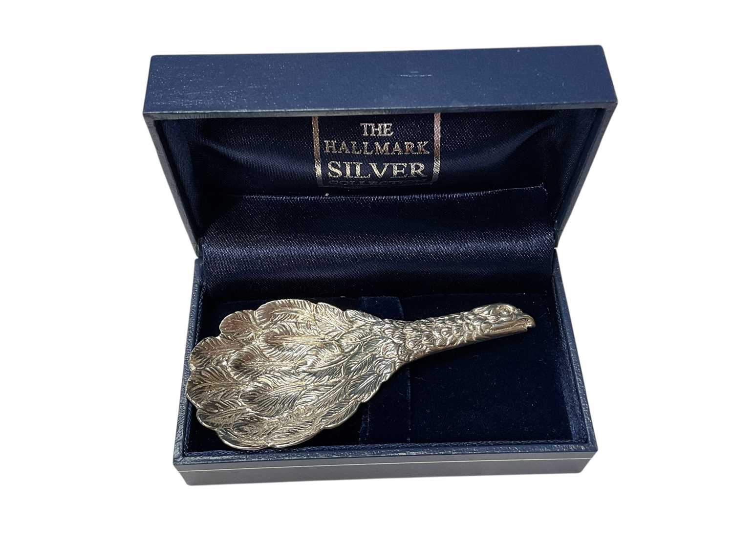 Lot 229 - Contemporary eagle silver caddy spoon (Sheffield 1999, with Millenium mark), 8.5cm