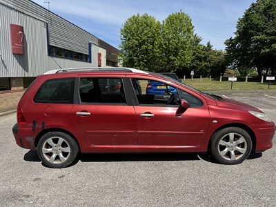 Lot 2 - 2006 Peugeot 307 SE Estate, 1.6 HDi 110 SE, 5 door manual, reg. no. LN06 OFB, finished in red with a cloth interior. The car has covered 154,000 miles, MOT expired 1st October 2024. It is suppli...