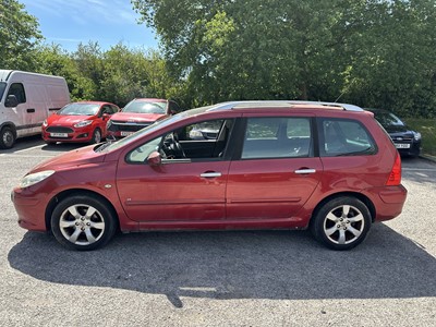Lot 2 - 2006 Peugeot 307 SE Estate, 1.6 HDi 110 SE, 5 door manual, reg. no. LN06 OFB, finished in red with a cloth interior. The car has covered 154,000 miles, MOT expired 1st October 2024. It is suppli...
