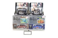 Lot 2714 - Diecast selection of The Beatles collectables -...