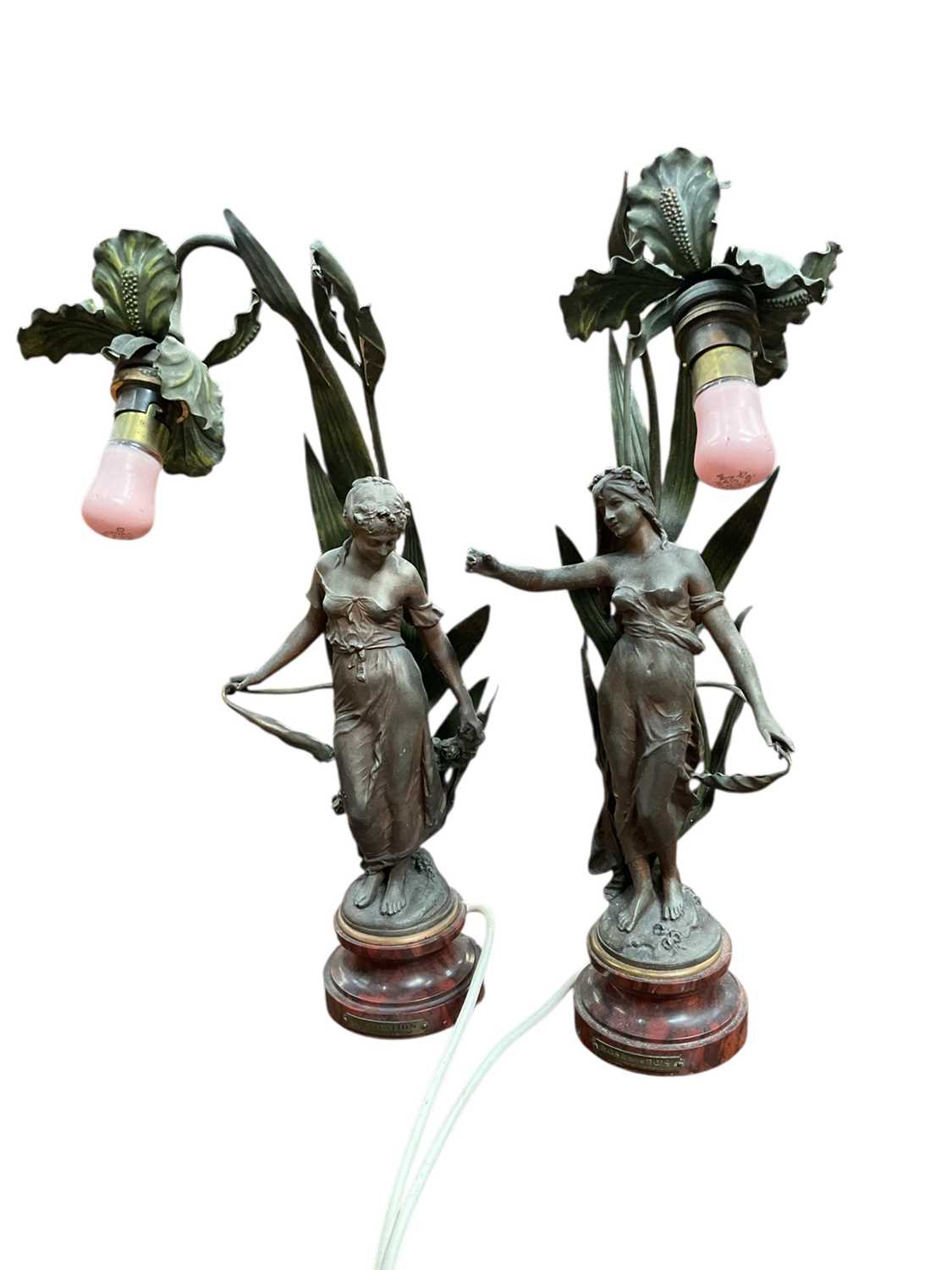 Lot 256 - After Auguste Moreau - pair of French Art Nouveau patinated spelter figural lamps