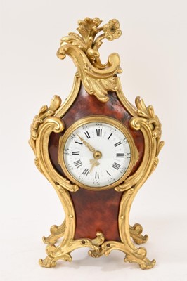 Lot 621 - Late 19th century French rococo red tortoiseshell and ormolu mantel clock with enamelled dial, cylinder movement by Paris maker, 28cm high, with key
