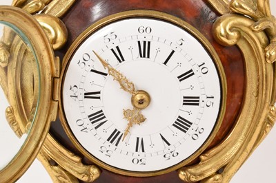 Lot 621 - Late 19th century French rococo red tortoiseshell and ormolu mantel clock with enamelled dial, cylinder movement by Paris maker, 28cm high, with key
