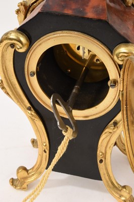 Lot 621 - Late 19th century French rococo red tortoiseshell and ormolu mantel clock with enamelled dial, cylinder movement by Paris maker, 28cm high, with key