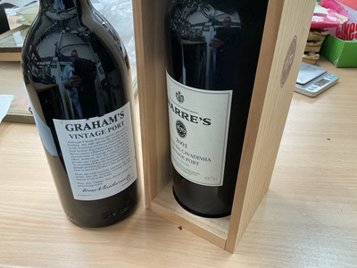 Lot 653 - Warre 2001 Quinta da Cavadinha vintage port in case, and a bottle of Graham's 1983 vintage port (leaking slightly) (2 bottles)