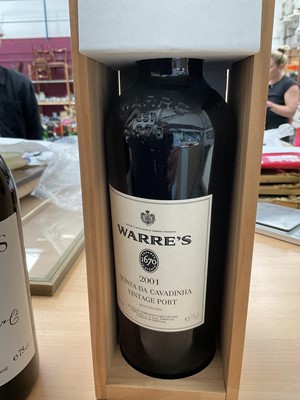 Lot 653 - Warre 2001 Quinta da Cavadinha vintage port in case, and a bottle of Graham's 1983 vintage port (leaking slightly) (2 bottles)