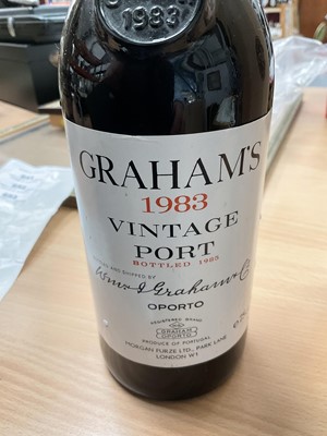 Lot 653 - Warre 2001 Quinta da Cavadinha vintage port in case, and a bottle of Graham's 1983 vintage port (leaking slightly) (2 bottles)