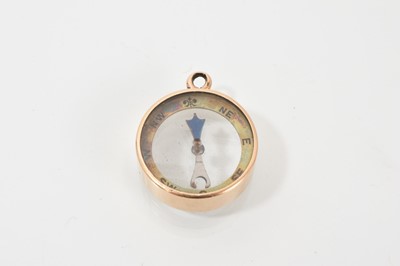Lot 723 - Edwardian 15ct rose gold compass fob