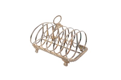 Lot 555 - Georgian silver toast rack