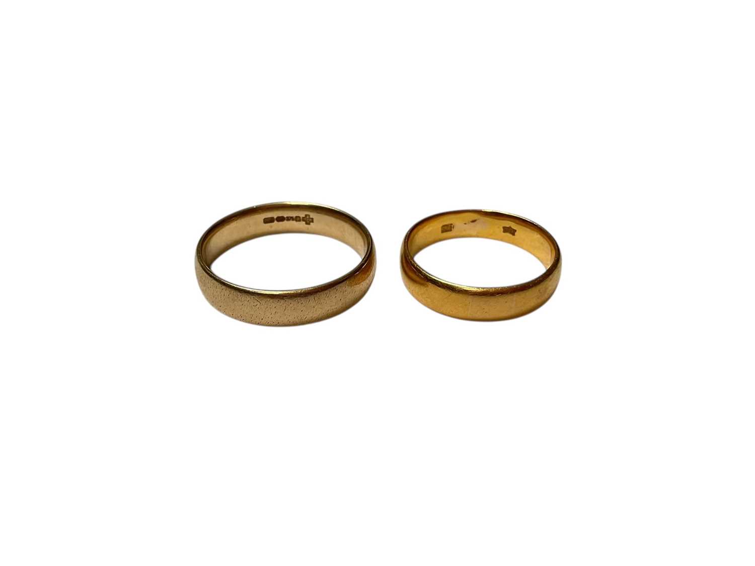 Lot 221 - 9ct gold wedding ring (London 2000), size T½ and a yellow metal wedding ring (tests at 22ct gold), size O