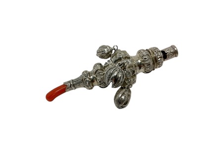 Lot 559 - Vicotrian silver rattle with coral teether