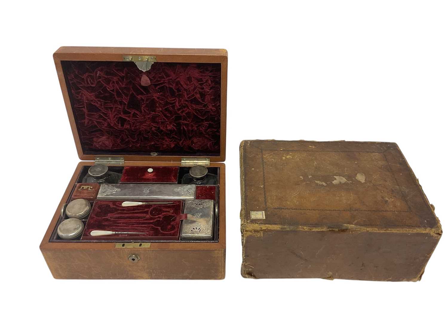Lot 562 - Toiletry box with silver mounted glass jars etc