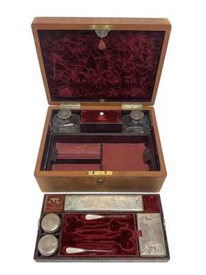 Lot 562 - Toiletry box with silver mounted glass jars etc
