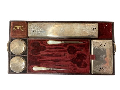 Lot 562 - Toiletry box with silver mounted glass jars etc