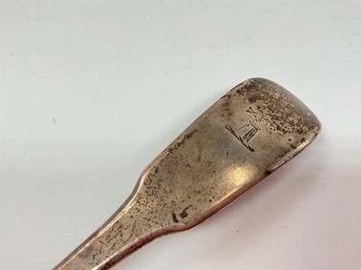 Lot 1141 - Georgian silver serving spoon with engraved crest (London 1806)