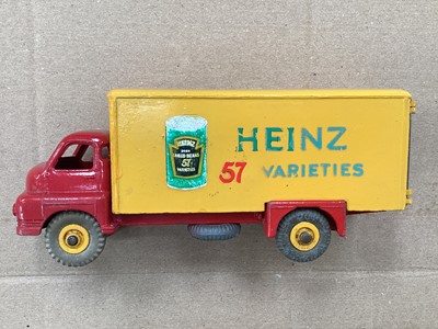Lot 1752 - Dinky Supertoys Foden Flat truck with tailboard No.903, Leyland Octopus Flat Truck with chains No.935 & Heinz bedford van No.923, all in original boxes (Repainted) (3)