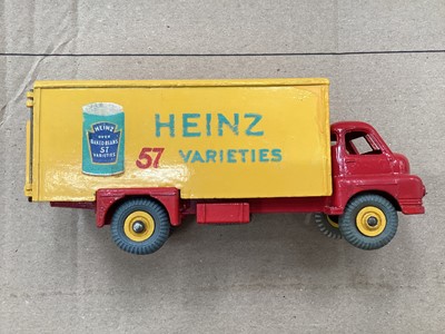 Lot 1752 - Dinky Supertoys Foden Flat truck with tailboard No.903, Leyland Octopus Flat Truck with chains No.935 & Heinz bedford van No.923, all in original boxes (Repainted) (3)