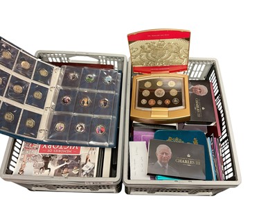 Lot 473 - World - Two stacker boxes containing a mixed selection of Westminster & Jubilee Mint coin sets and part coin sets to include 75th Anniversary of VE Day 50p Collection 2020, Charles III Coron...