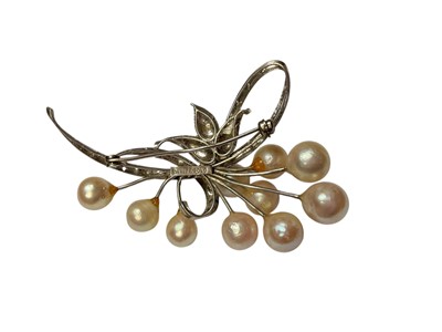 Lot 59 - Cultured pearl floral spray brooch, with applied plaque to reverse marked 'WHITE GOLD'. 65mm