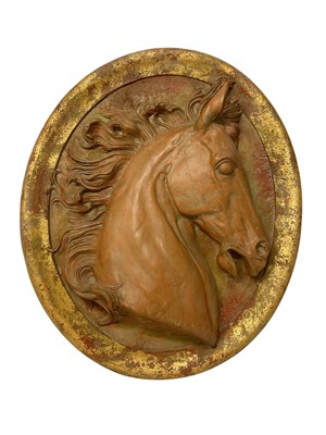 Lot 334 - Large oval relief plaque of a horse
