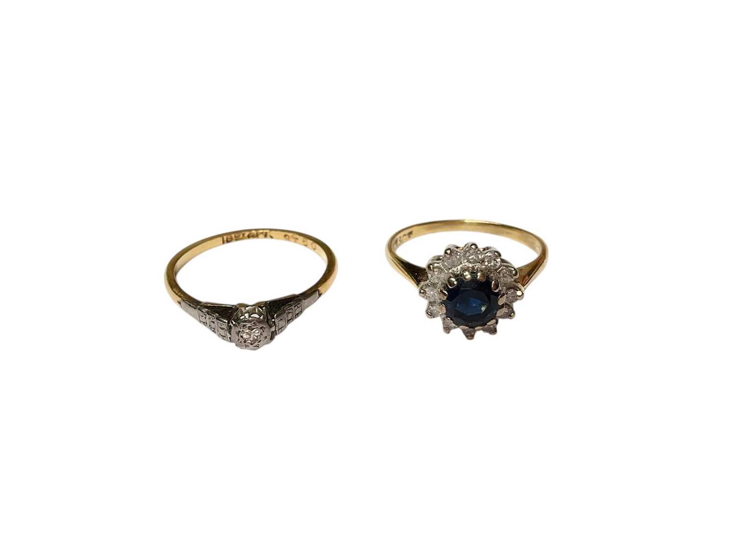 Lot 5 - 18ct gold diamond single stone ring in platinum setting and 18ct gold gem set cluster ring (2)
