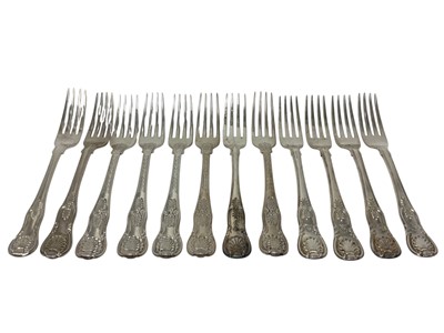 Lot 514 - Twelve George II and later silver Queens pattern table forks
