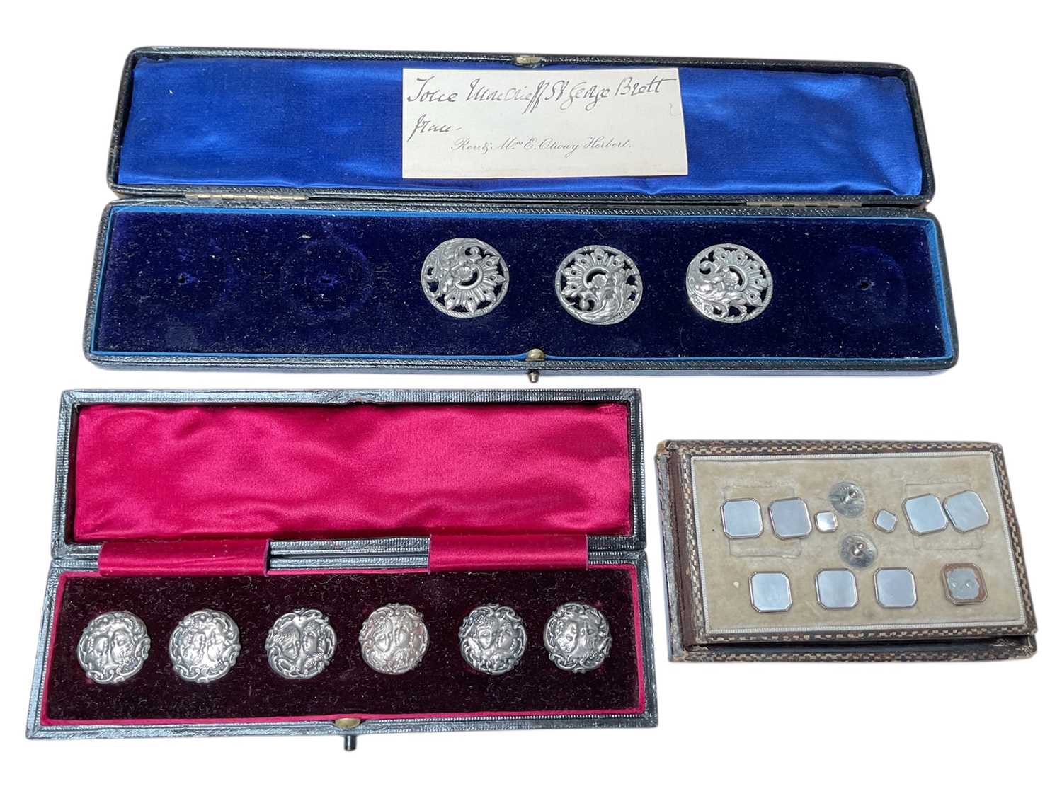 Lot 6 - Art Deco set of silver and 14ct gold cufflinks and stud set with mother of pearl panels, together with a set of six Art Nouveau silver buttons and three other silver buttons, all in fitted cases...