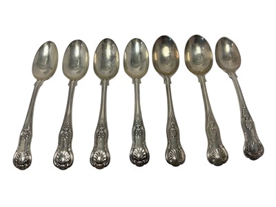 Lot 518 - Seven silver Kings pattern teaspoons.