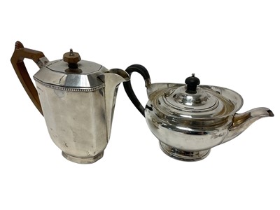 Lot 531 - Silver teapot and 1940s silver hot water pot (2)