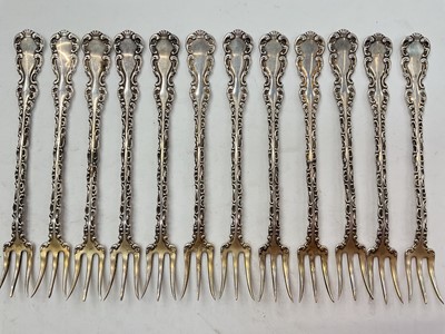 Lot 1081 - Set of twelve American silver (stamped sterling) pickle forks