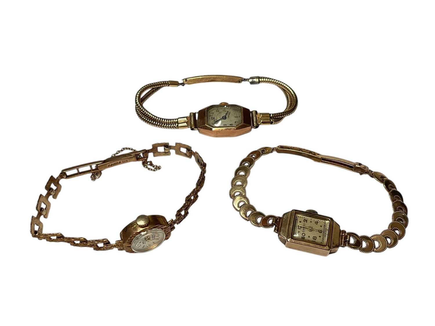 Lot 198 - Three vintage 9ct gold cased ladies' wristwatches, two on 9ct gold bracelets and one plated