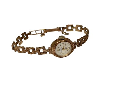 Lot 198 - Three vintage 9ct gold cased ladies' wristwatches, two on 9ct gold bracelets and one plated