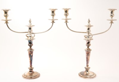 Lot 437 - Pair late 19th/early 20th century silver plated three light candelabra, with tapering stems