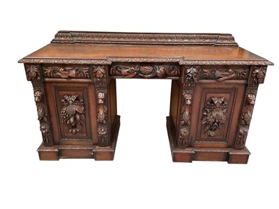 Lot 1501 - 19th century Flemish carved oak pedestal sideboard