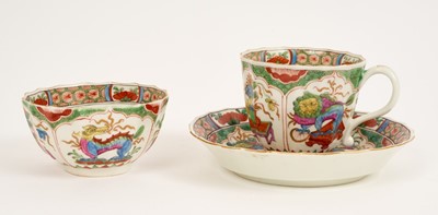 Lot 22 - Worcester trio, circa 1770, of fluted form, polychrome decorated with the 'Dragons in Compartments' pattern, pseudo-Chinese marks to bases, the saucer 11.75cm diameter