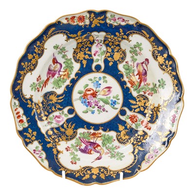 Lot 206 - A Worcester cabinet plate, circa 1770, decorated in the Lady Mary Wortley Montagu pattern, painted in the London atelier of James Giles with panels of exotic birds around a central floral rounde...