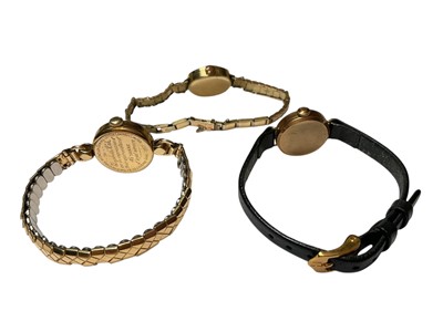 Lot 31 - 1950s 9ct gold cased Griffon ladies' wristwatch on expandable gold plated bracelet, 9ct gold cased Seiko ladies wristwatch on leather strap and a gold plated watch (3)