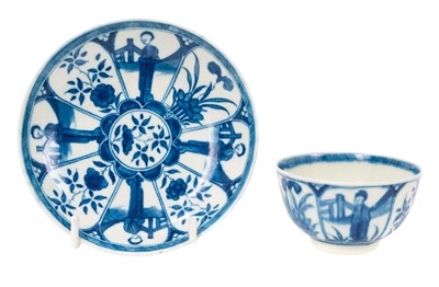 Lot 211 - A rare Worcester tea bowl and saucer, circa 1768-70, painted in the 'Arcade' pattern with panels containing 'Long Eliza' type figures, pseudo-Chinese marks, the saucer 10.4cm diameter Pr...
