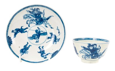 Lot 212 - A Worcester tea bowl and saucer, circa 1770, painted in underglaze blue in the 'Eloping Bride' pattern, the back of the saucer with ribboned emblems, pseudo-Chinese marks, the saucer 10.5cm diam...