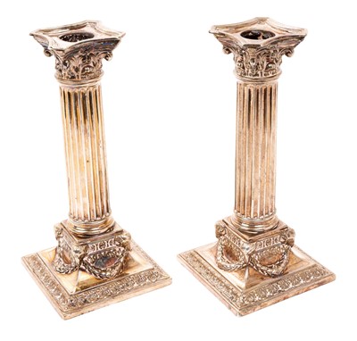 Lot 457 - Pair of silver Corinthian column candlesticks