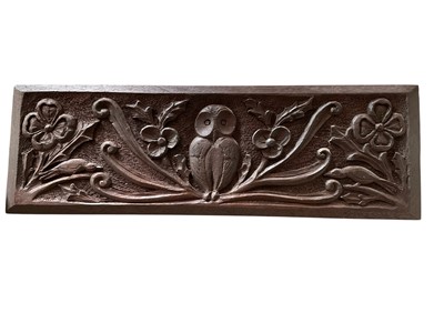 Lot 216 - Carved oak panel, with owl motif and group of walking sticks