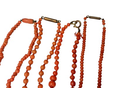 Lot 45 - Four antique coral bead necklaces and one other broken
