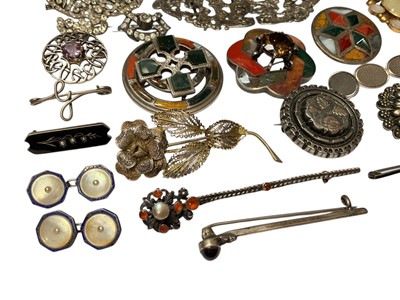 Lot 46 - Collection of silver and white metal brooches including Scottish hardstone brooches, agate brooches, paste set brooches, Victorian silver buckle, silver and mother of pearl fruitknife etc
