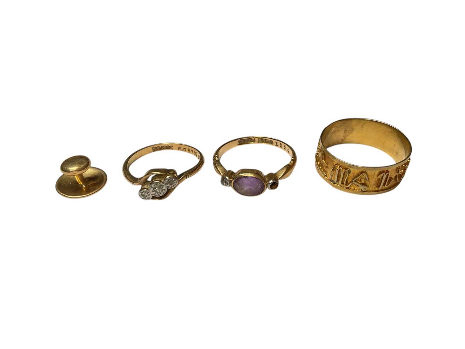 Lot 51 - 18ct gold diamond three stone cross-over ring, 18ct gold gem set ring, one 18ct gold stud and a yellow metal ring with wire work decoration